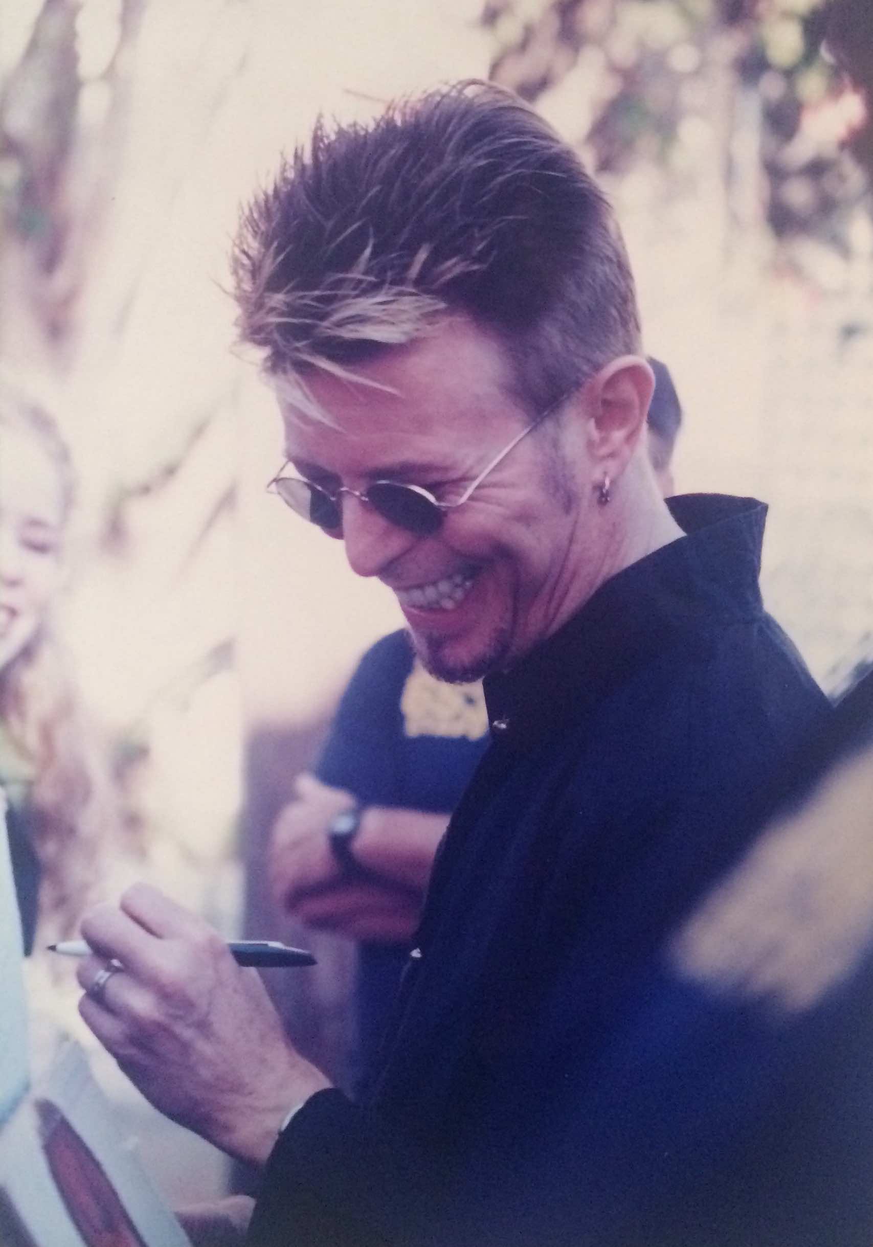 David Bowie by Kelley Curtis outside Chili Pepper2 10-7-97