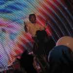Wayne Coyne sings atop a bear at the House of Blues, Orlando. Photo by Hans Morgenstern.