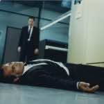 Adrian Hooven, Ivan Desny (standing) in World on a Wire. Image courtesy of Janus Films.