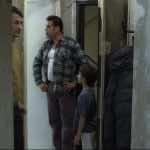 Cristi Puiu with the neighbors in Aurora. Film Still courtesy of the Cinema Guild