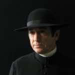 Father Dinis (Adriano Luz) in Mysteries of Lisbon. Film Still courtesy of Music Box