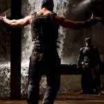 Bane (Hardy) and Batman (Bale) face off in ‘The Dark Knight Rises.’ Image courtesy of Warner Bros. Pictures.