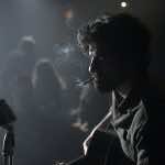 Oscar Isaac performing in Joel and Ethan Coens INSIDE LLEWYN DAVIS