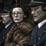 Tilda Swinton and officers in Snowpiercer